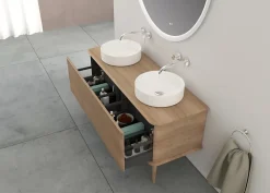 Baden Meuble sous-vasque à suspendre l.141 cm avec plan de toilette, 2 vasques à poser et pieds H.29 cm, effet chêne tabac, Idra